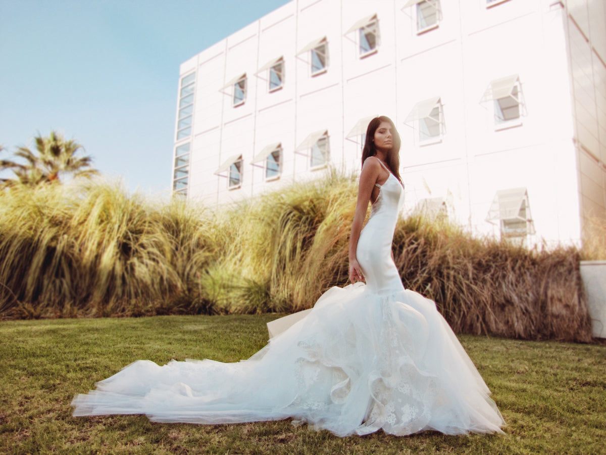 Modern mermaid wedding dress on grass