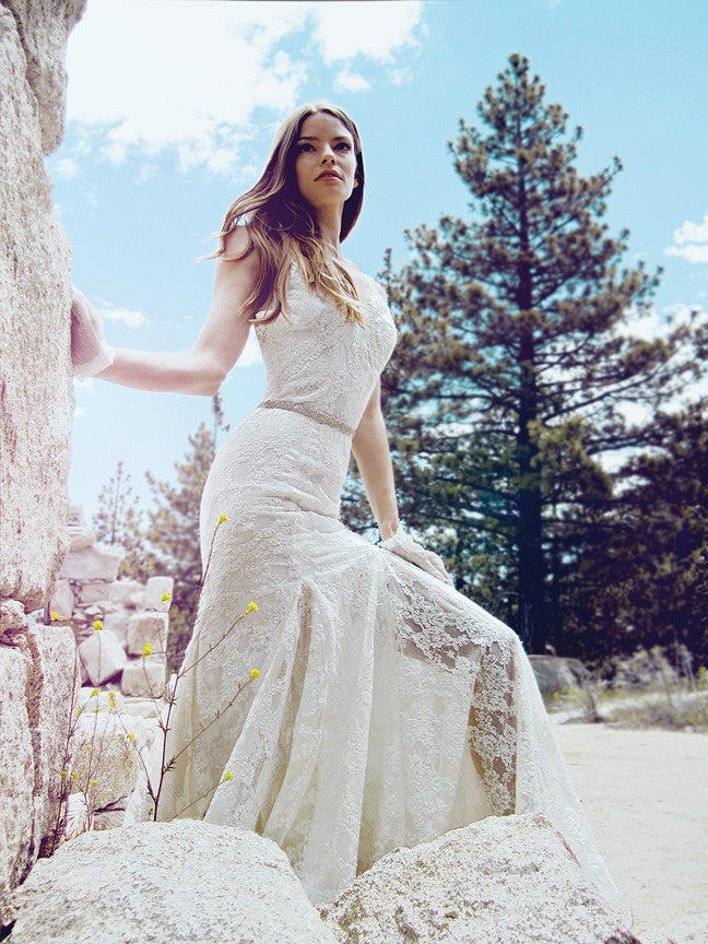 Lace illusion peek-a-boo mermaid wedding gown with pleats