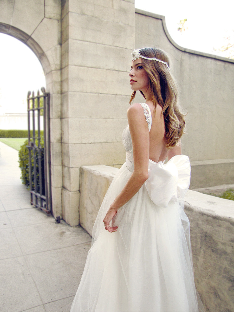 A-line bow wedding dress of tulle and lace. Lauren Elaine Briarleigh Gown.