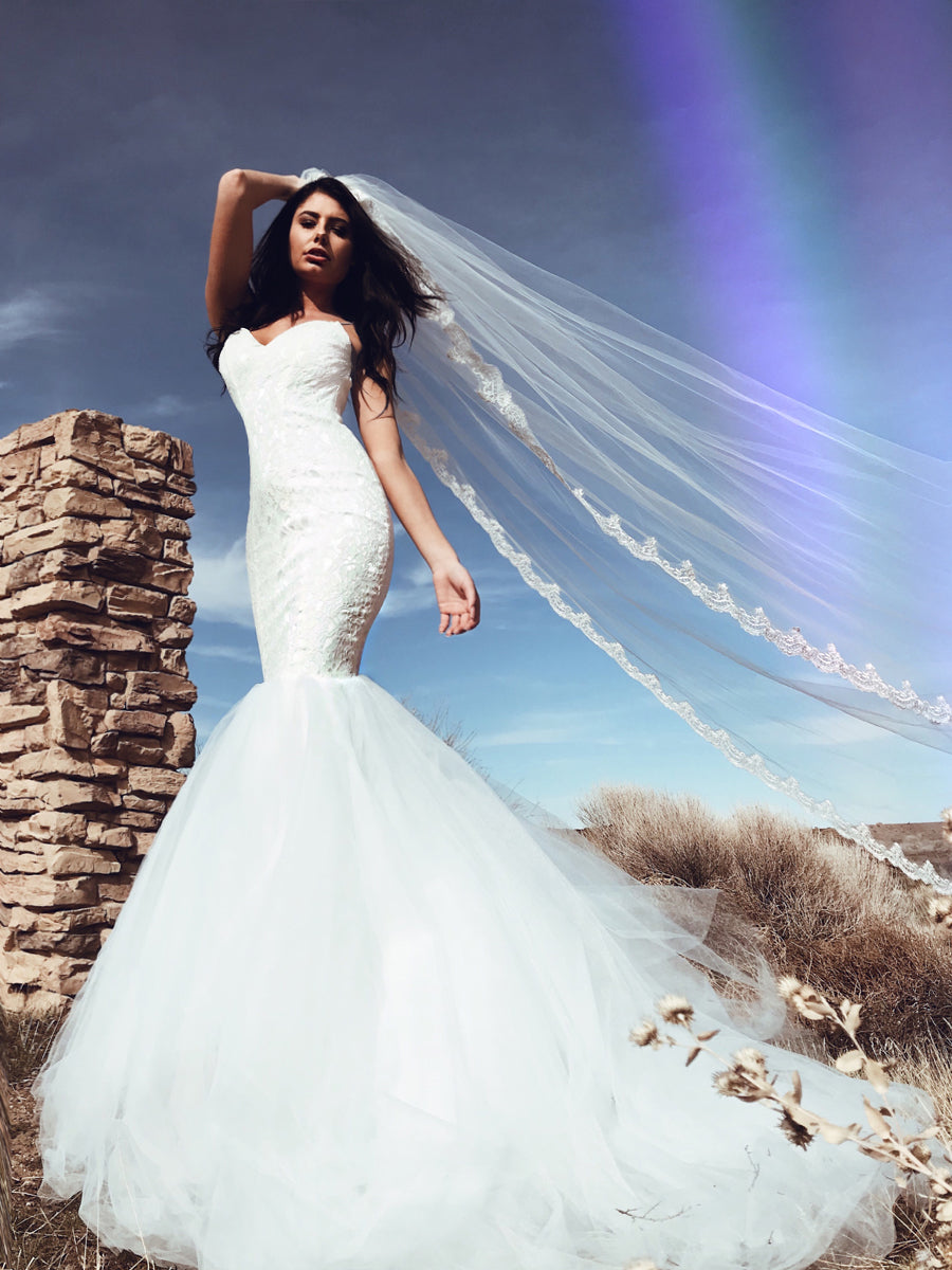 Sexy form-fit Lola mermaid wedding dress from Pearl by Lauren Elaine Bridal Collection.