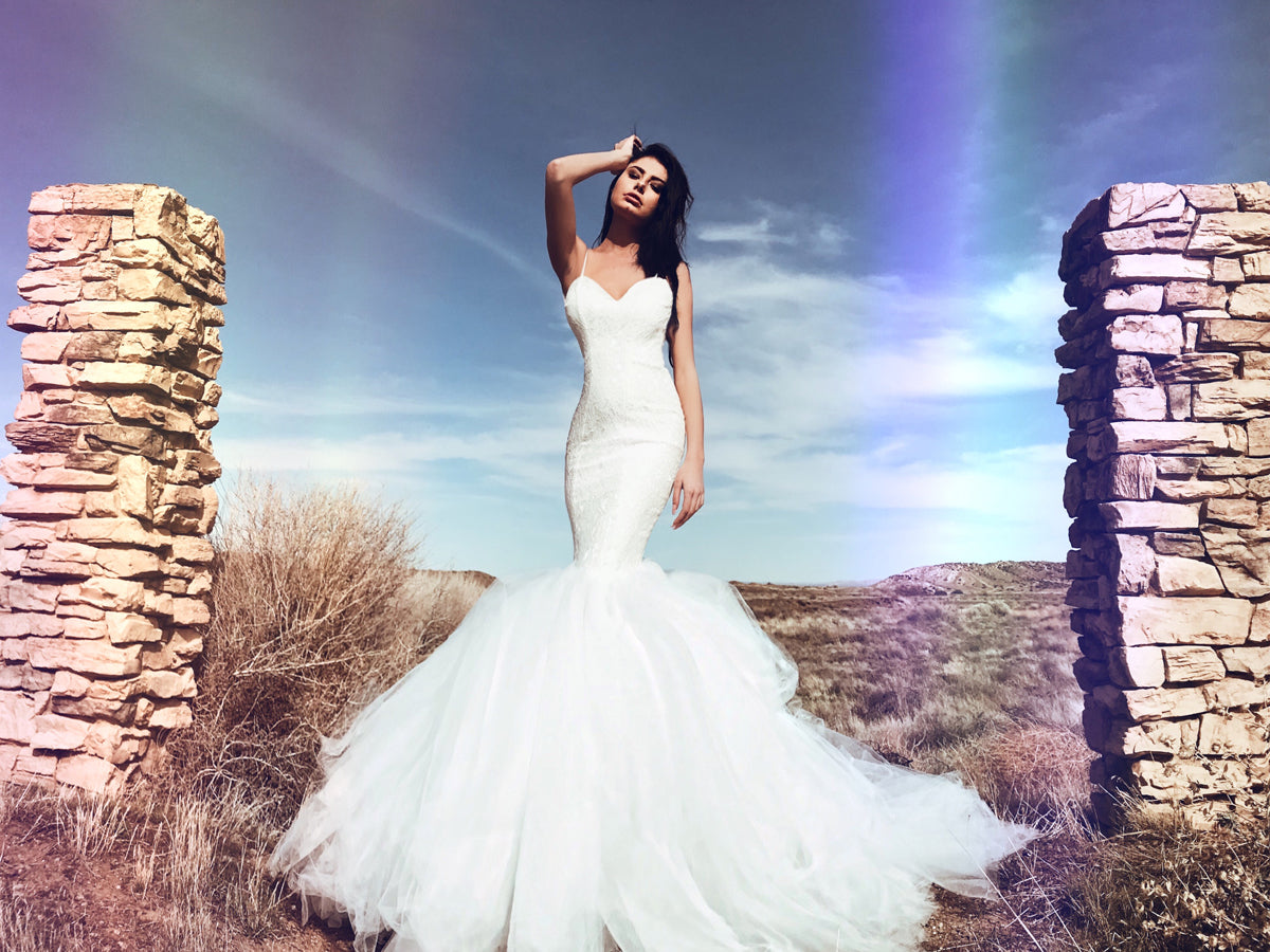 Sexy form-fit sparkle lace mermaid wedding dress with sweetheart neckline and glamorous feathered tulle skirt. Lola by Lauren Elaine Bridal.