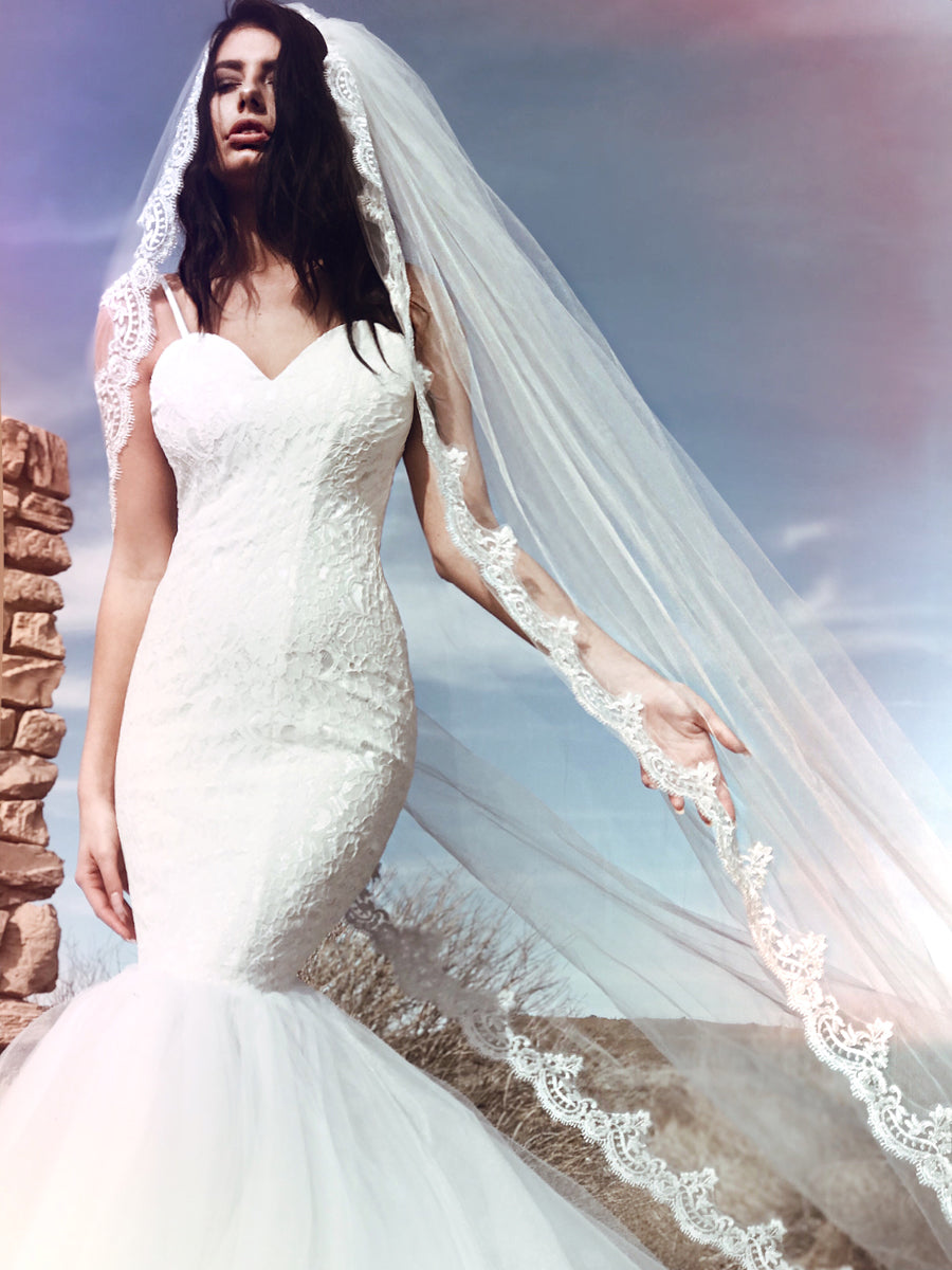 Sleek and modern mermaid wedding dress with sparkling sequin lace and sweetheart bodice by Lauren Elaine Bridal.