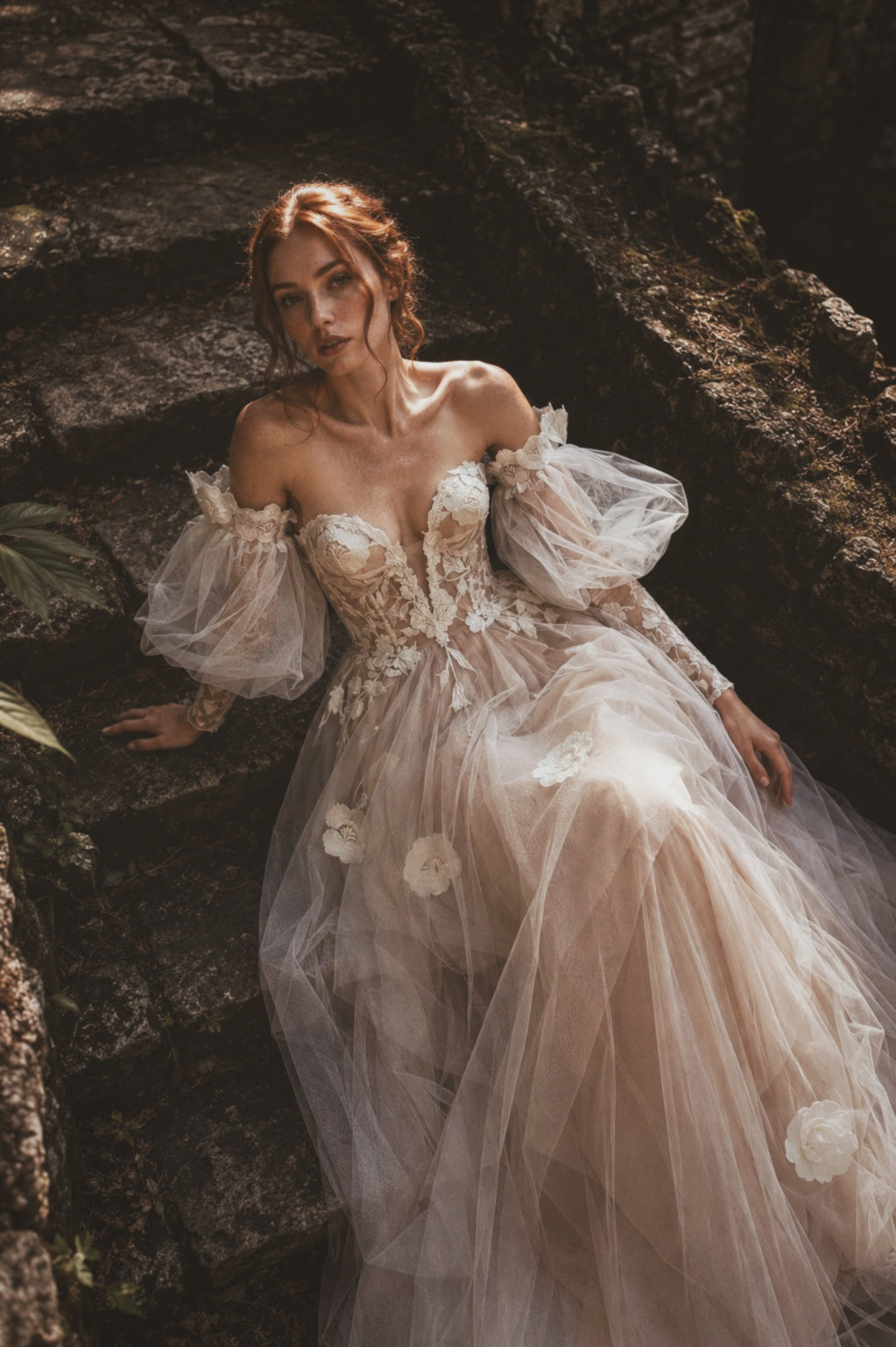 Arrowyn illusion corset wedding dress with botanical floral appliqué and detachable sleeves.