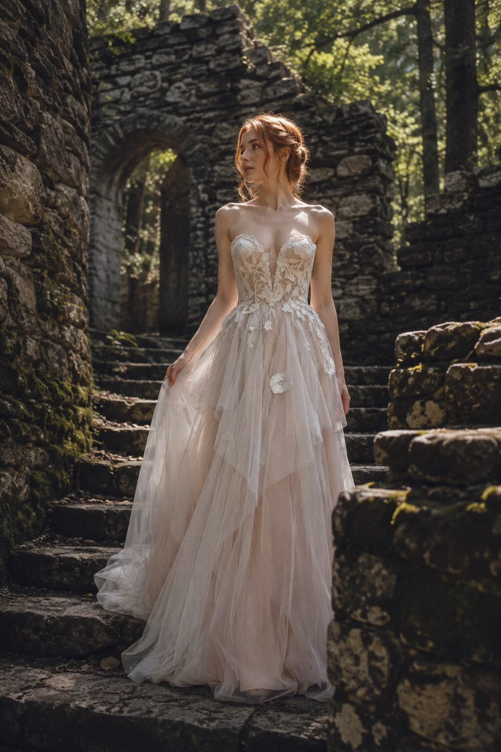 Arrowyn ethereal wedding dress with illusion corset and layered botanical tulle skirt.