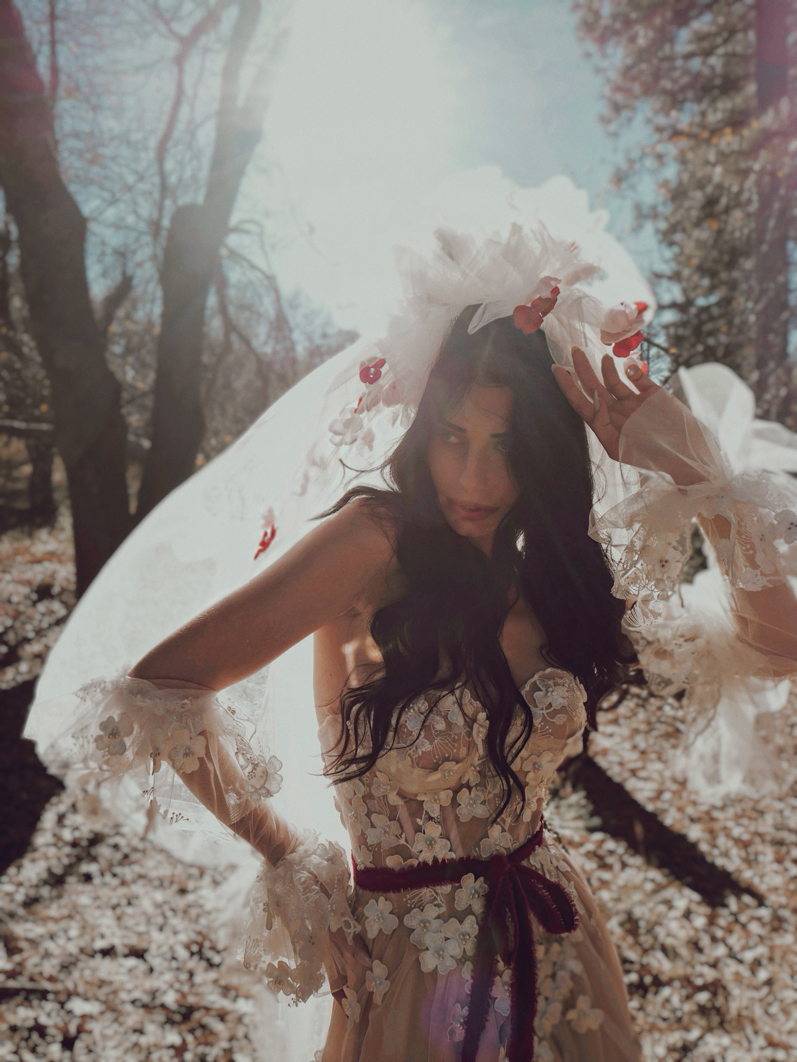 Editorial bridal portrait featuring the CHÉRIE 80s-style tulle veil with floral and pearl details by Lauren Elaine.