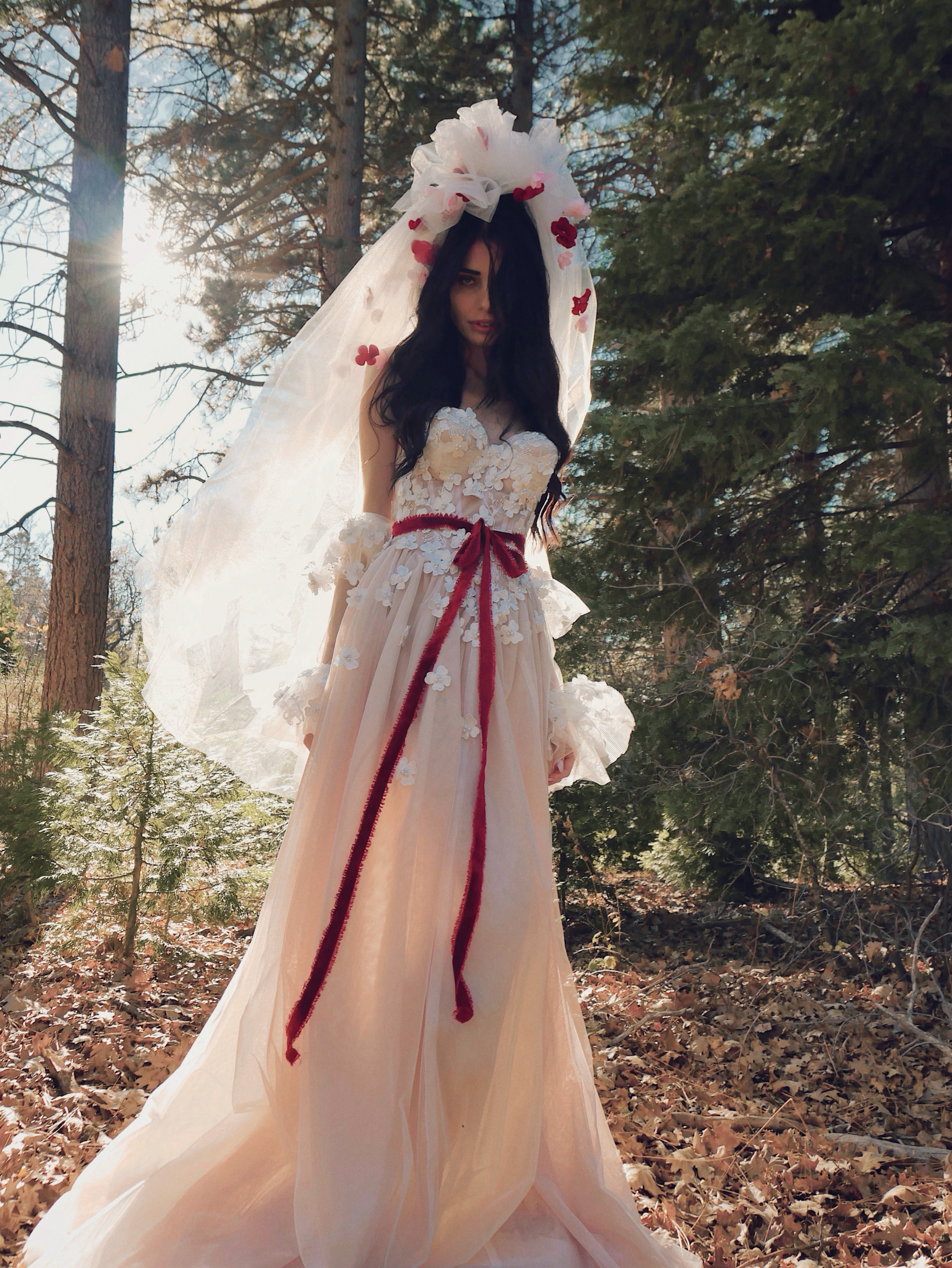 Vintage-inspired 1980s tulle wedding veil with oversized pouf and floral appliqués by Lauren Elaine.