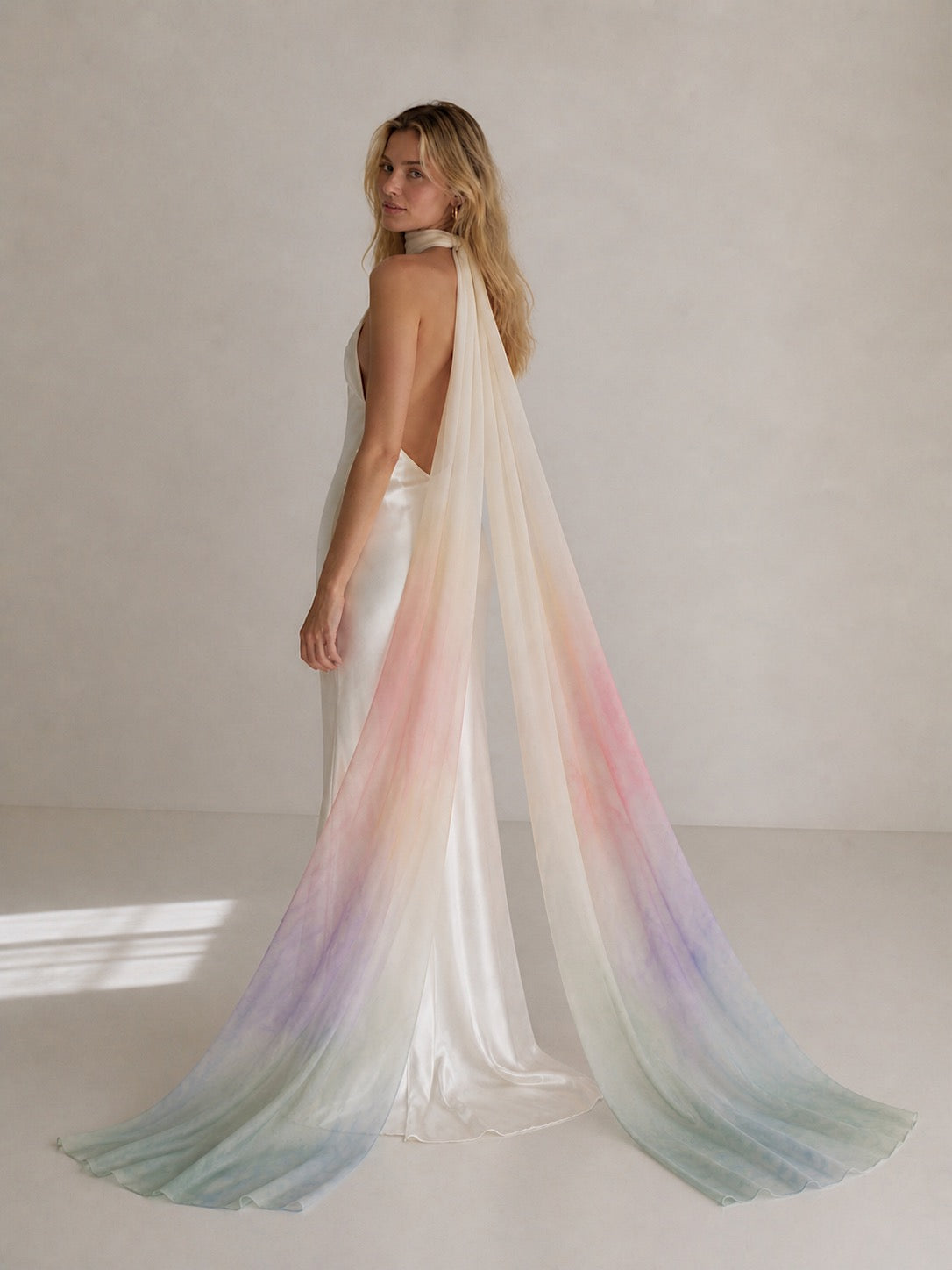 Colorful chiffon bridal scarf in custom rainbow watercolor palette styled with minimalist satin wedding dress
