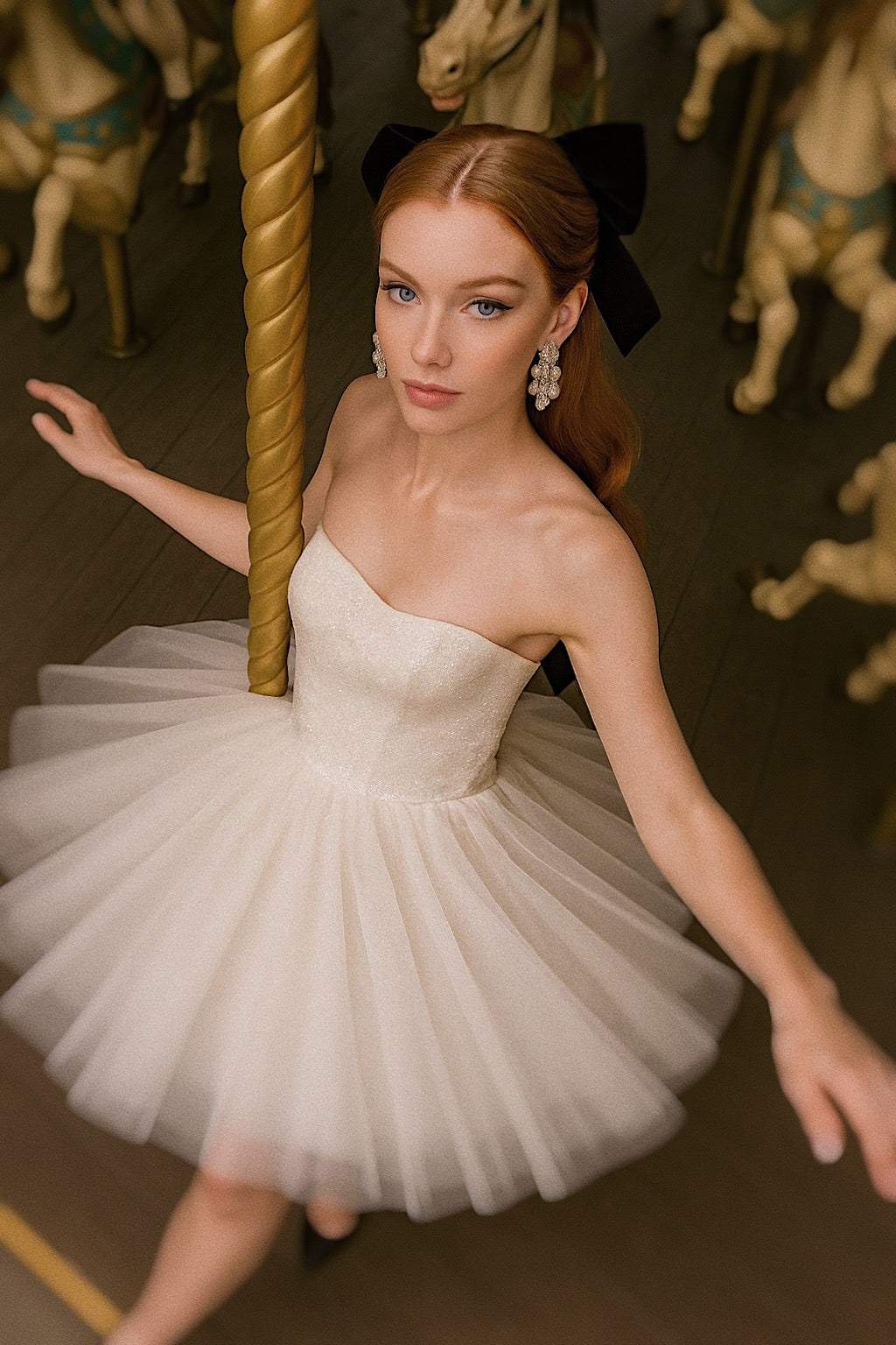Bride in Étoile mini wedding dress with sequin bodice and tulle skirt, photographed on carousel.