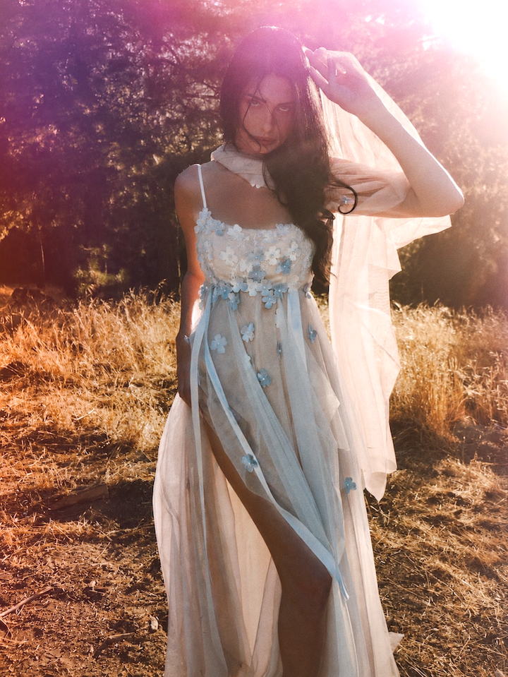 Florêve colorful floral wedding dress with blue 3D wildflower appliqués and sheer layered tulle