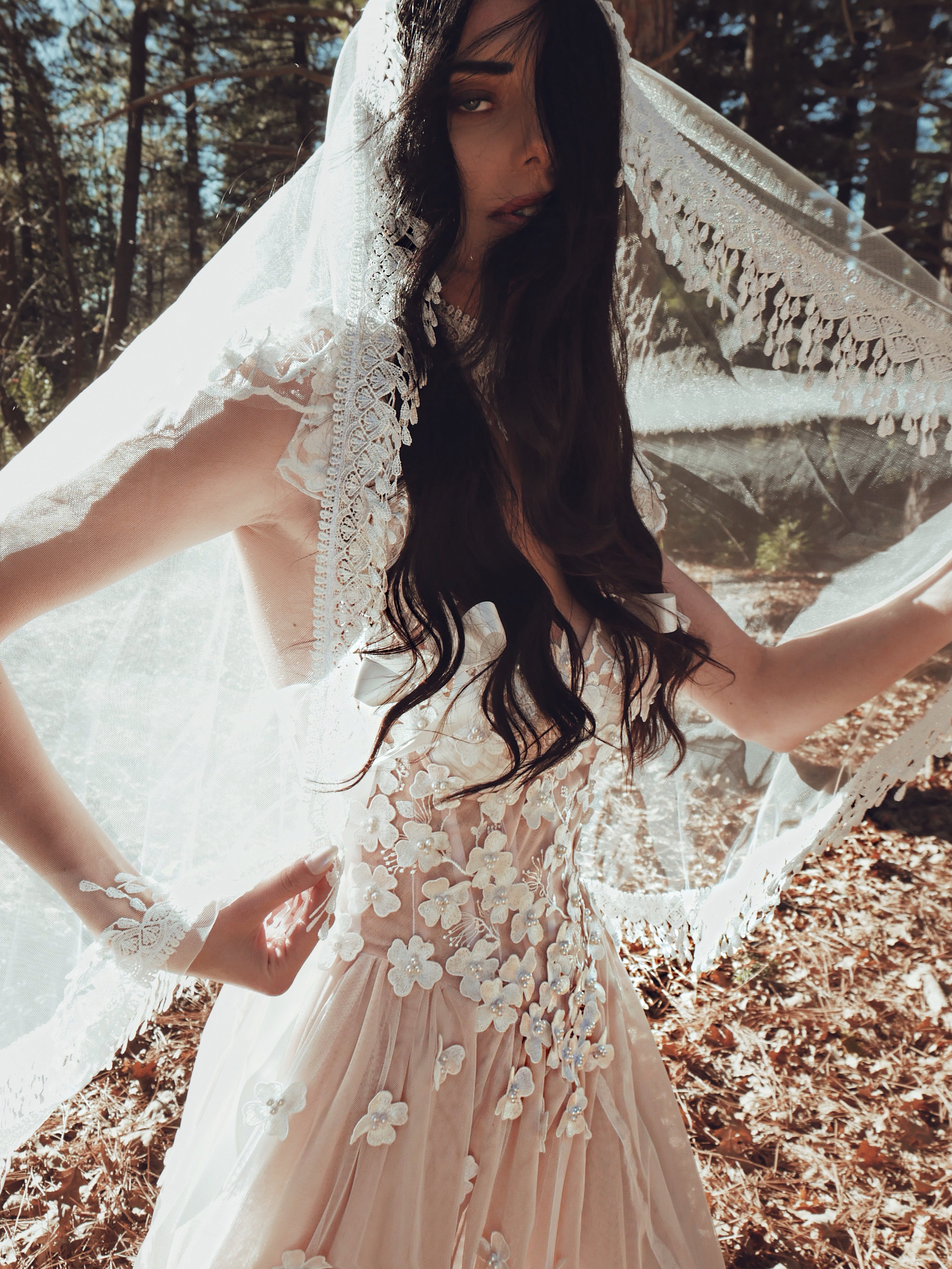 Boho chic crochet fringe wedding veil by Lauren Elaine Bridal, featuring delicate lace trim.