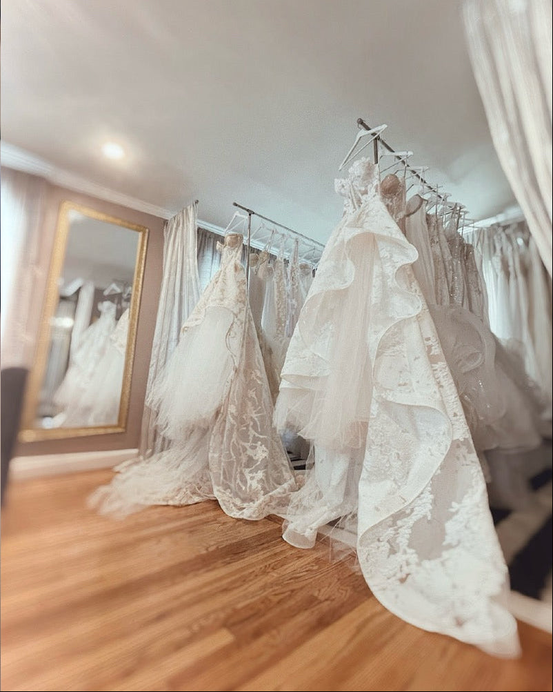 Wardrobe interior with wedding dresses inside the Lauren Elaine Los Angeles Bridal Salon