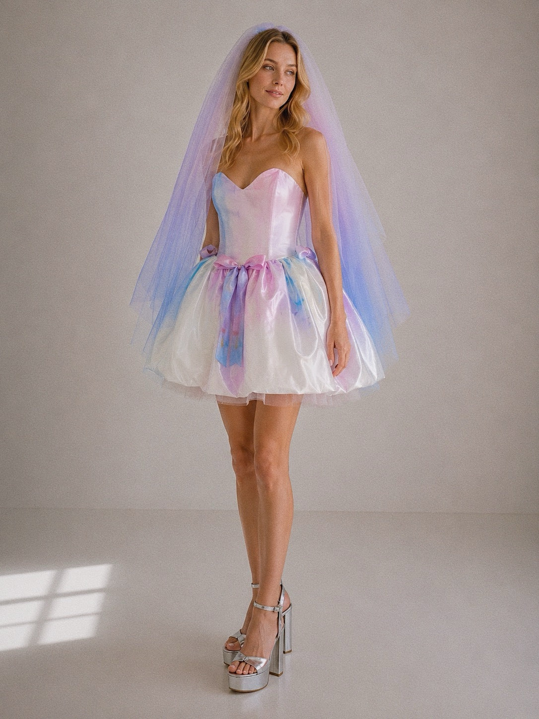 Moondreamer Mini colorful wedding reception dress with pastel watercolor satin, sweetheart neckline, and rainbow-inspired ribbon details
