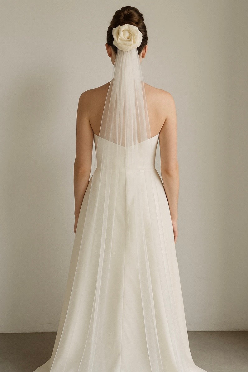 Full back view of ivory silk rose bridal veil with soft cascading tulle