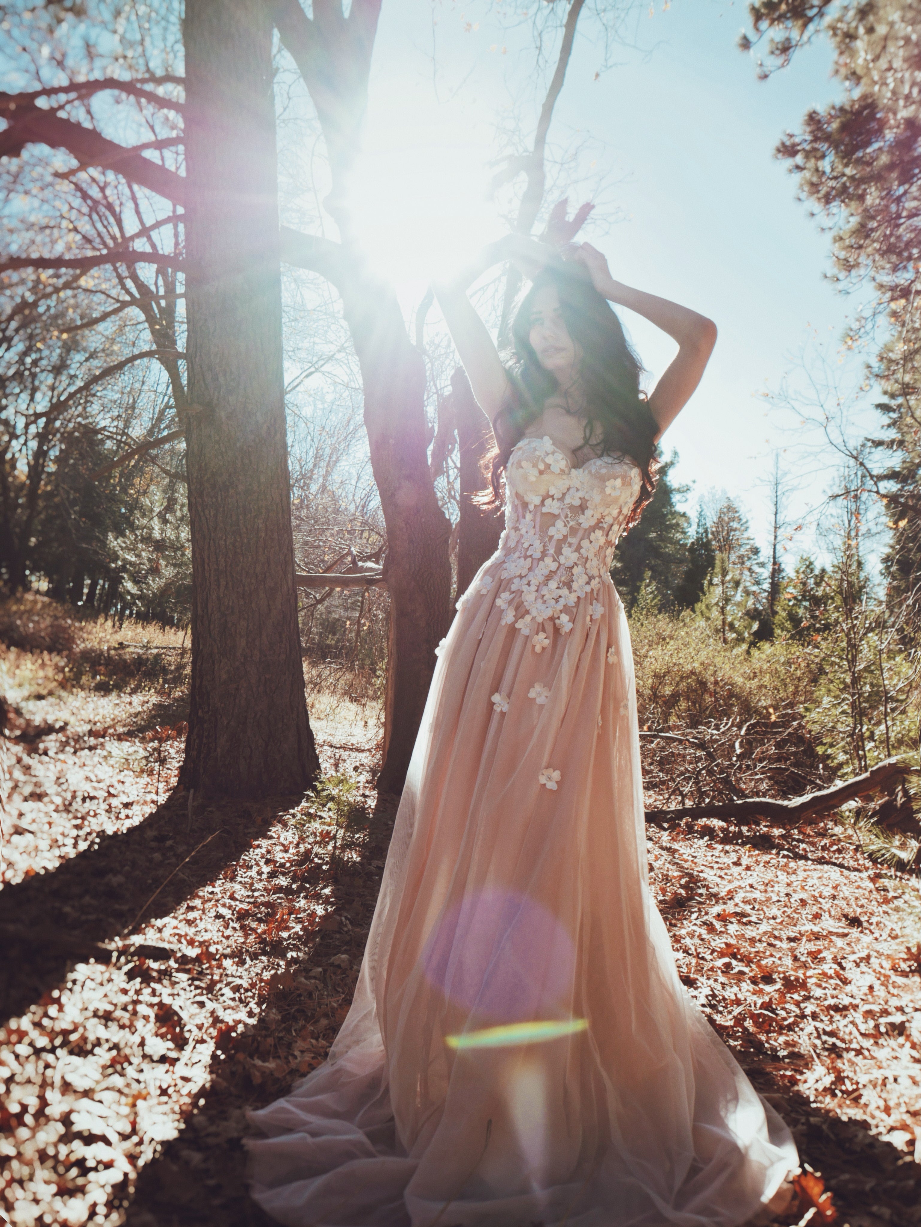 Valen blush wedding dress with 3D floral lace, basque waist silhouette, detachable sleeves, and soft romantic tulle skirt