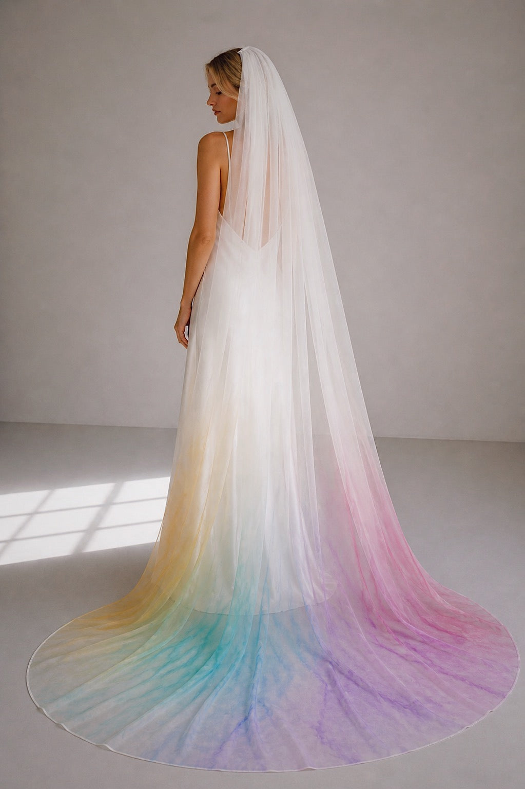 Chroma veil colorful wedding veil with hand-painted rainbow ombre chiffon and flowing cathedral train