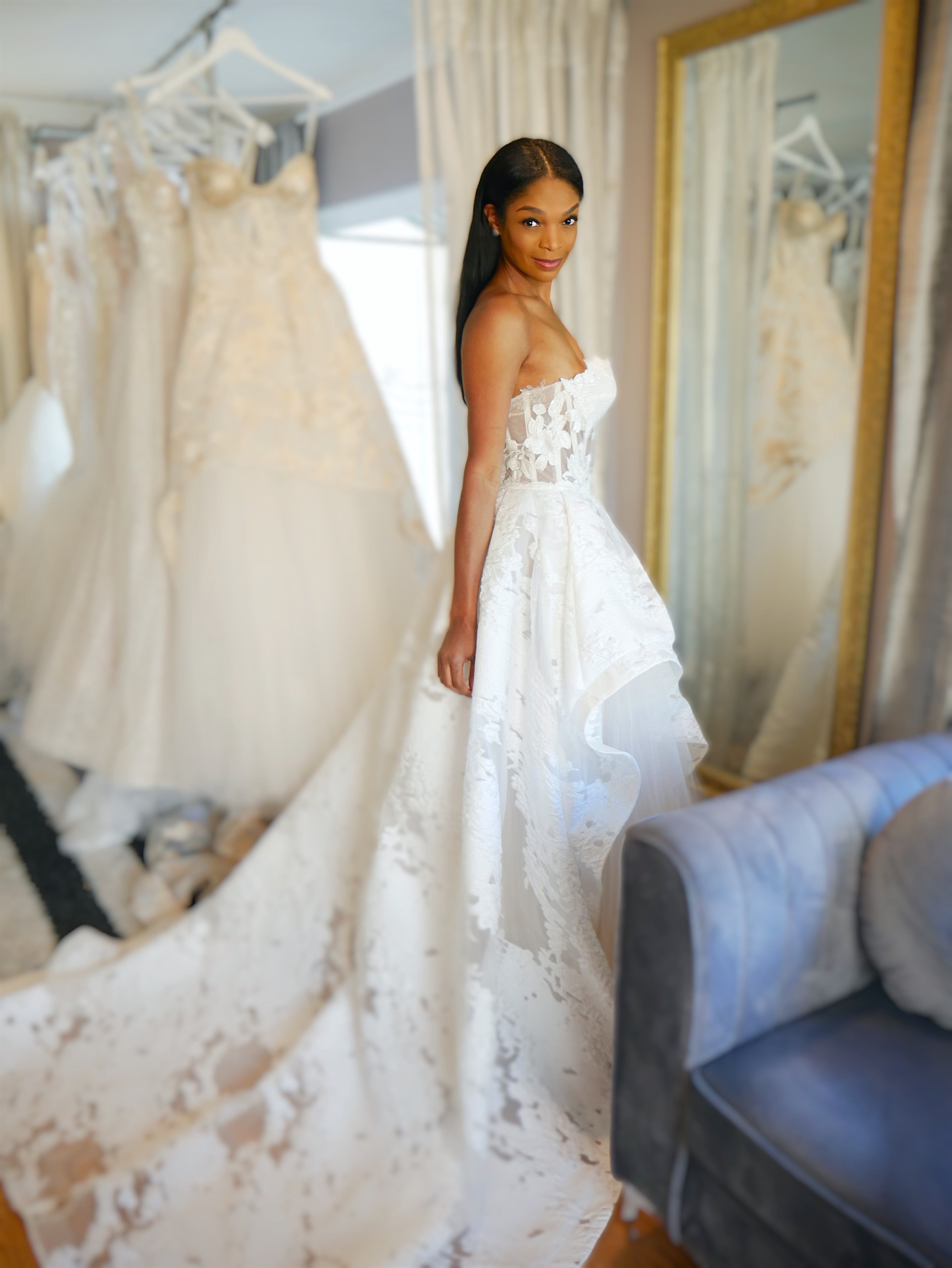 Bride wearing dramatic lace ballgown in Los Angeles bridal salon appointment