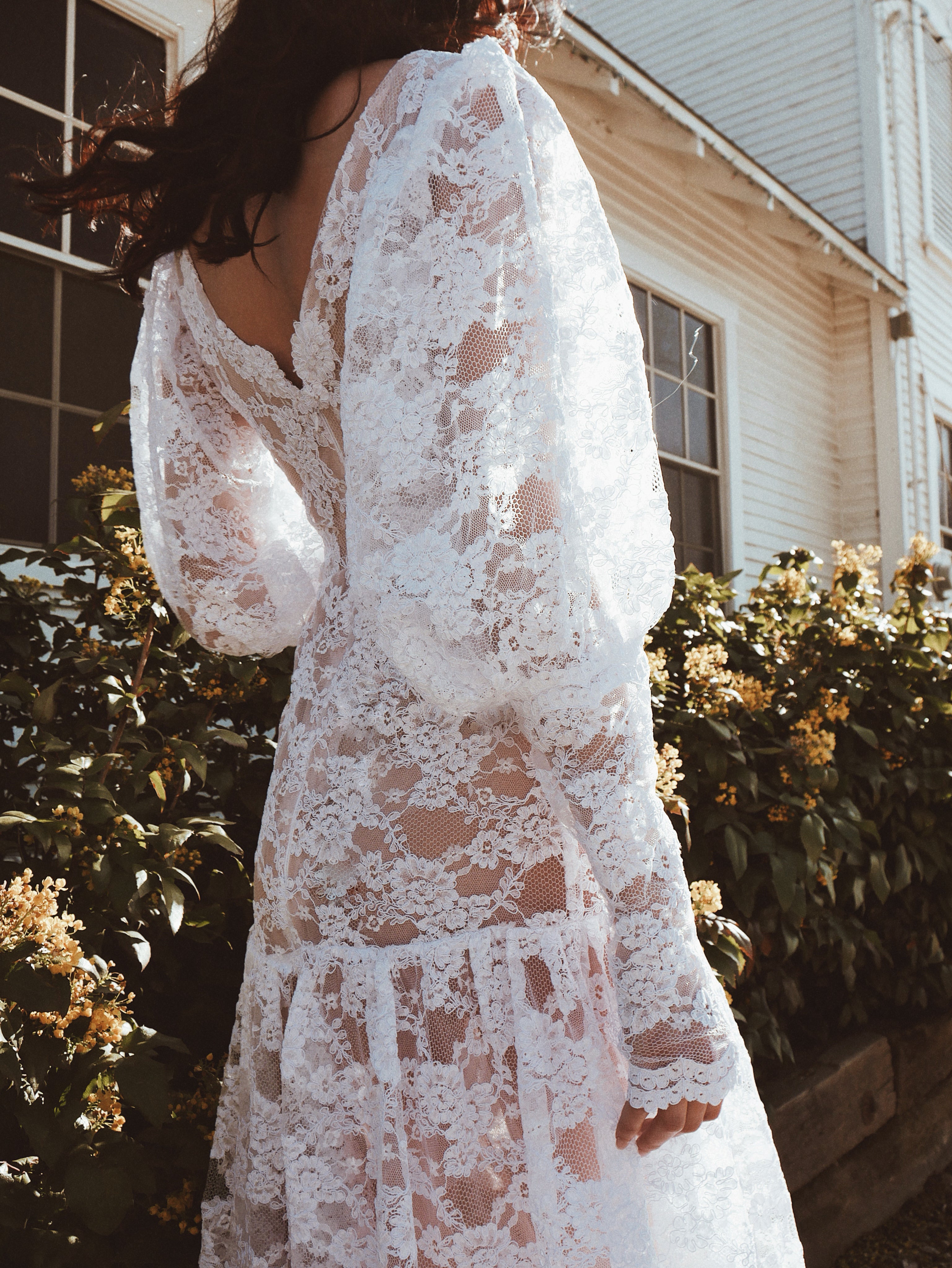 Dramatic lace gigot sleeves on the Lauren Elaine "Meadow" gown.