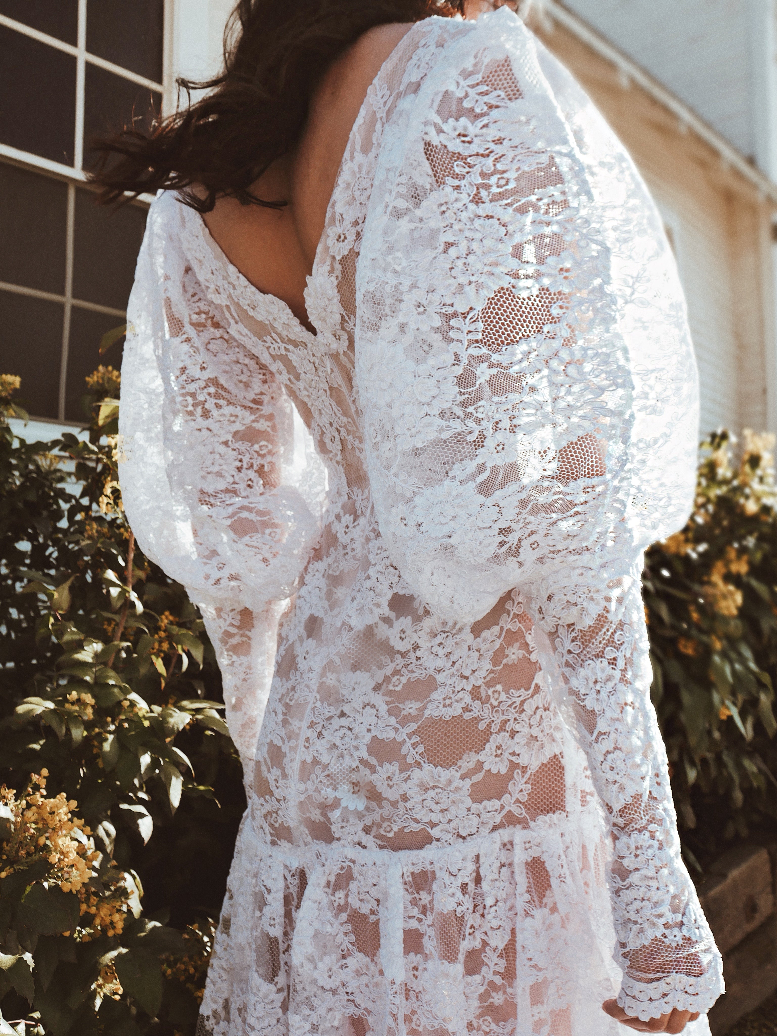 Dramatic lace gigot sleeves on the Lauren Elaine "Meadow" wedding dress.