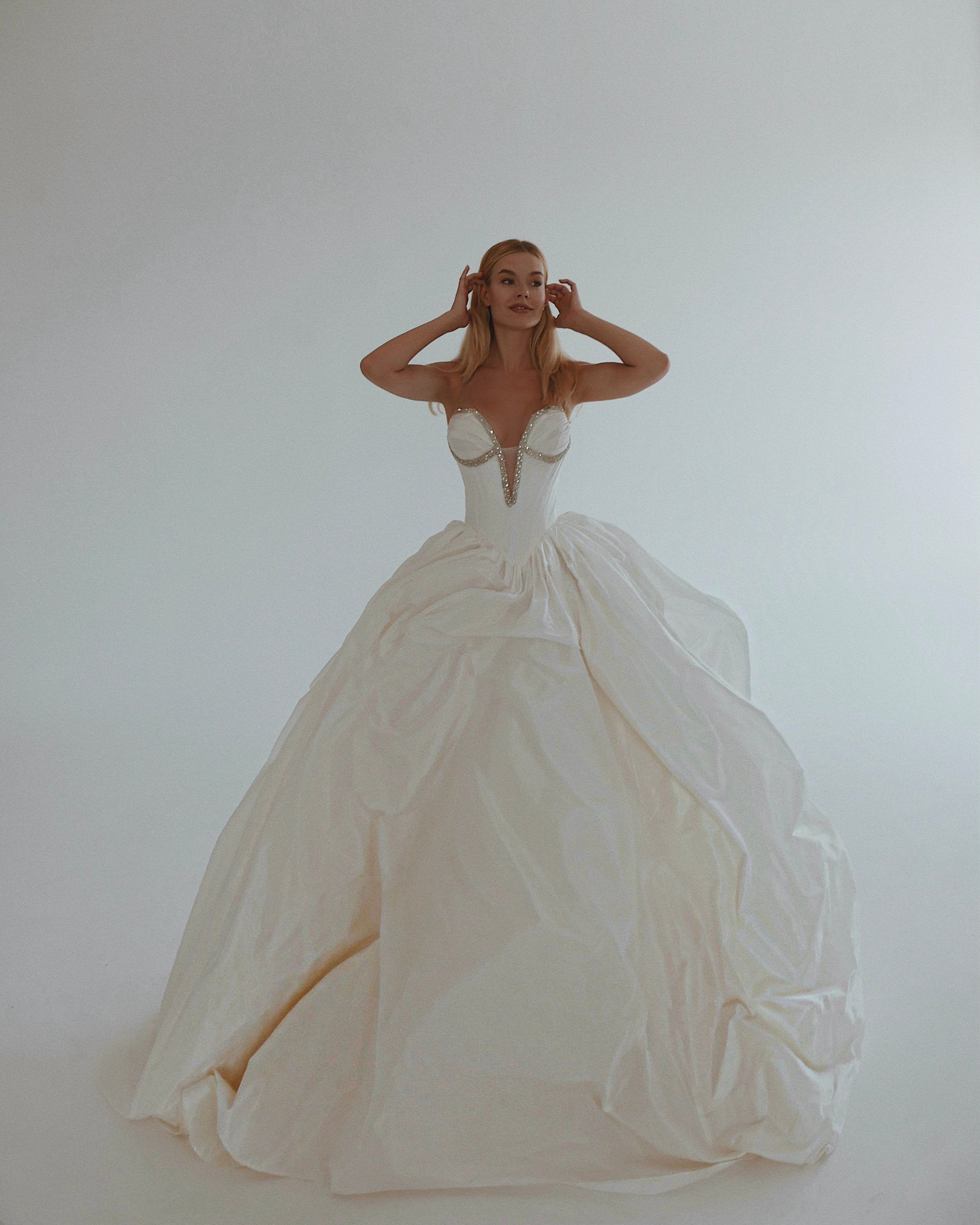 Lauren Elaine basque waist corset wedding dress with taffeta ball gown skirt