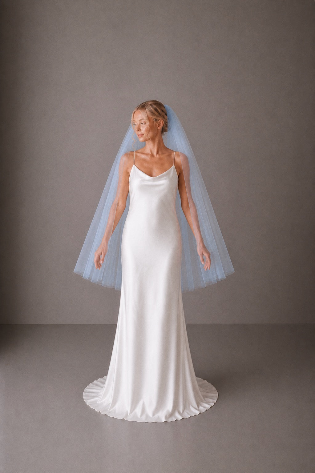 powder blue fingertip length tulle wedding veil full width short bridal veil raw edge