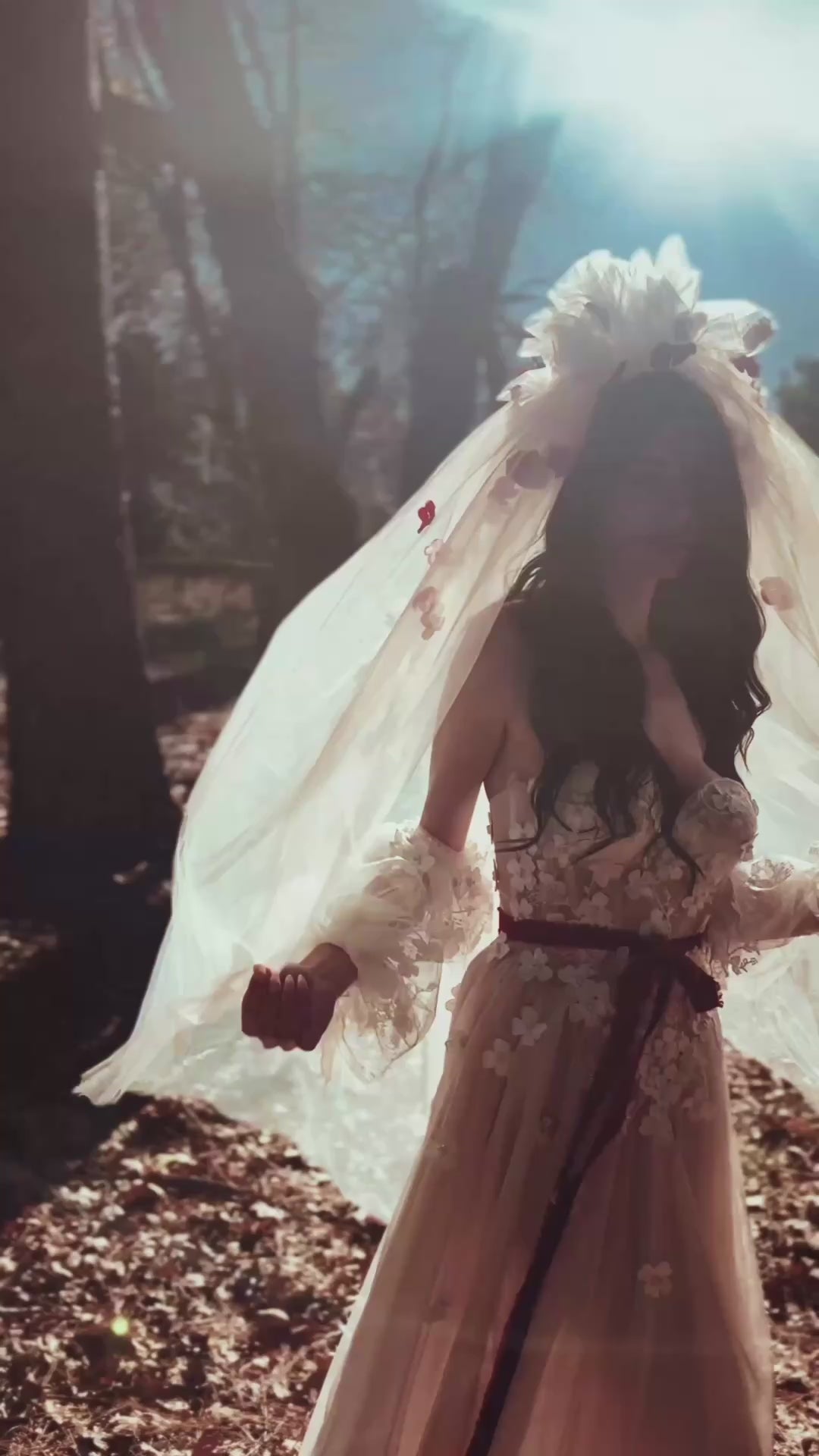 Long flowing vintage-style tulle veil with red and blush 3D flowers, CHÉRIE by Lauren Elaine.