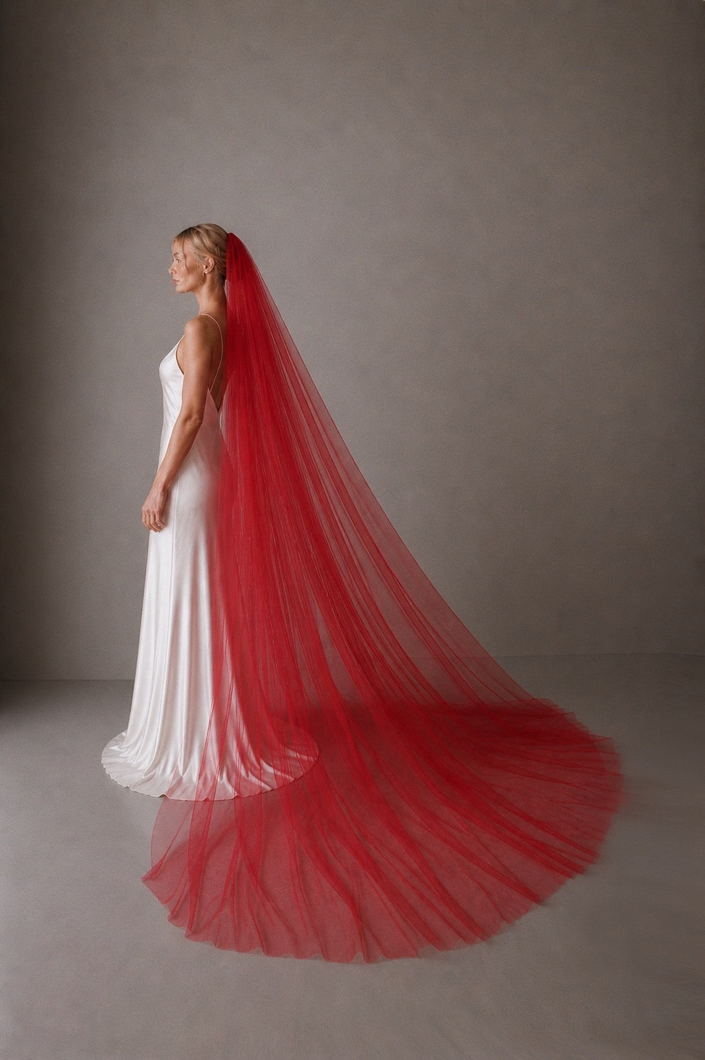 red tulle wedding veil full width chapel length raw edge bridal veil side profile