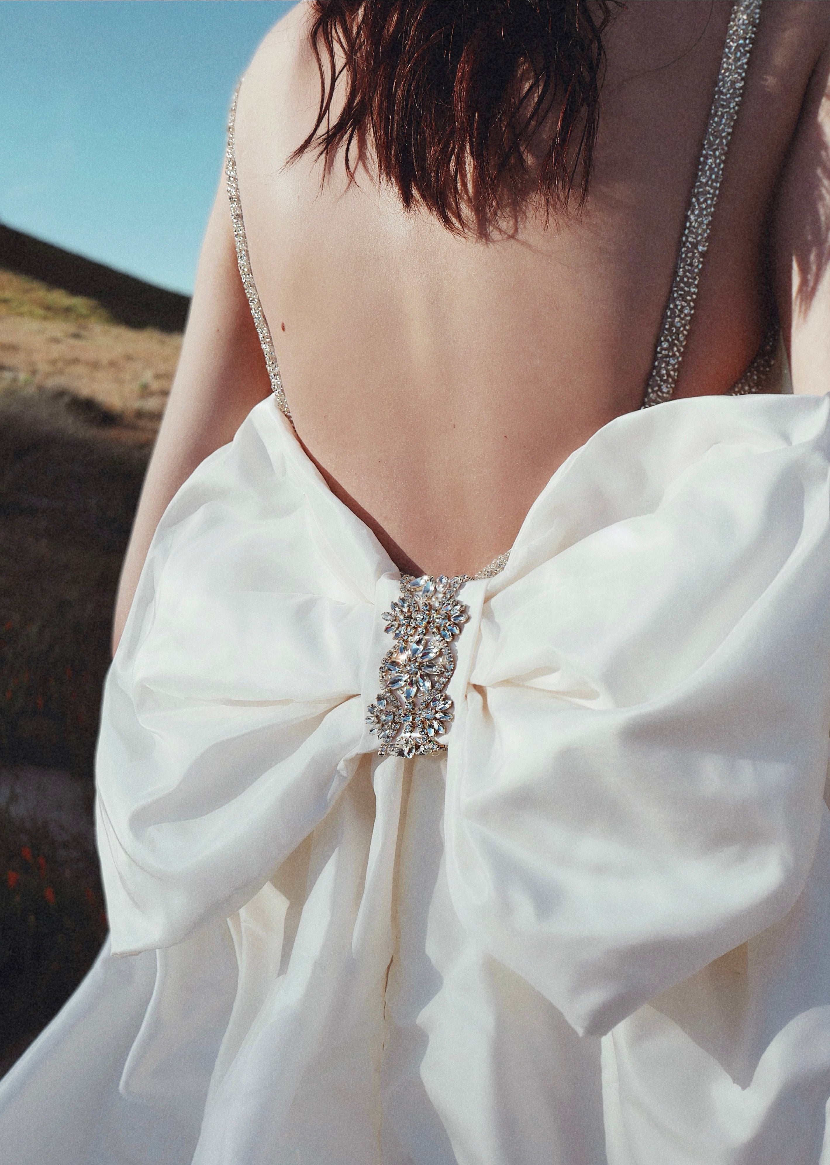 Detachable bow detailing on the Lauren Elaine Vespertine wedding gown
