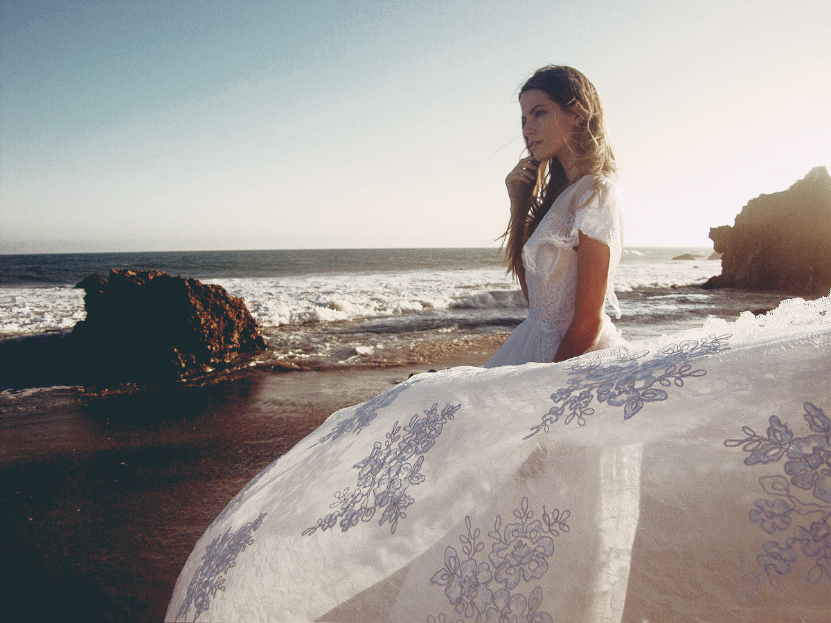 Wedding dresses and bridal gowns by Lauren Elaine with detachable trains. 