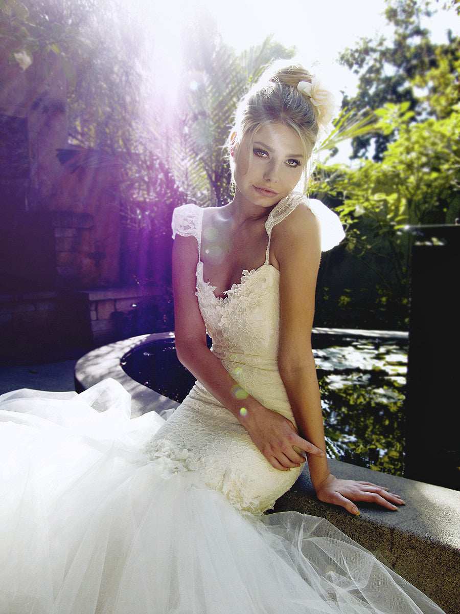 Lauren Elaine Aurelia Gown. Cap lace sleeve and tulle mermaid wedding with train.