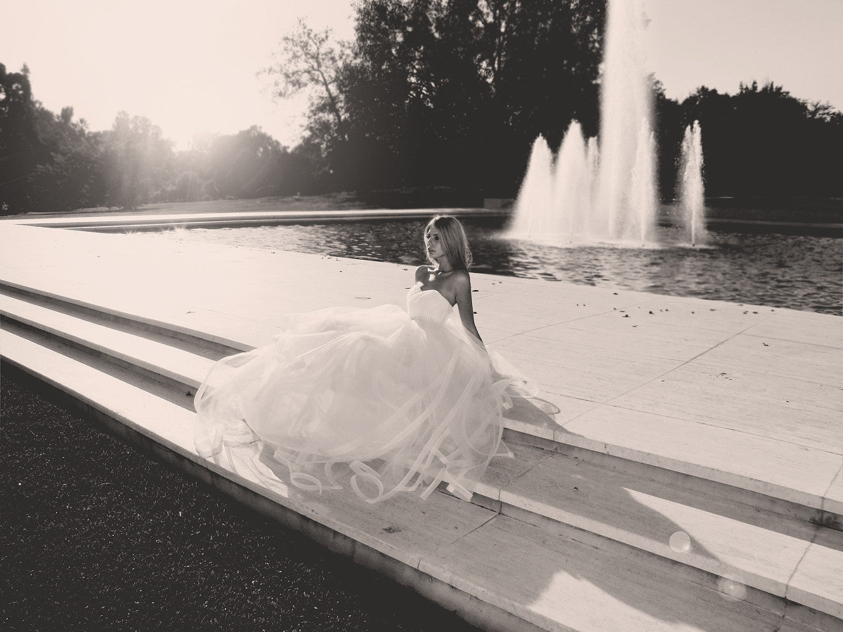 Princess wedding gown of layered tulle and horsehair with dramatic open back