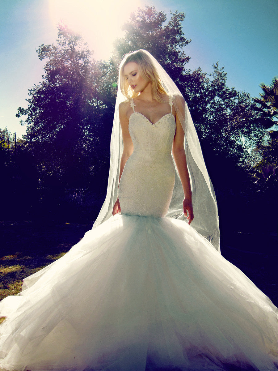 Oriana by Lauren Elaine Bridal. Tulle and lace mermaid wedding gown with pearls.