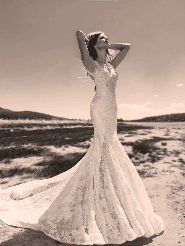 Backless lace mermaid wedding gown with scallop lace detailing by Lauren Elaine. 