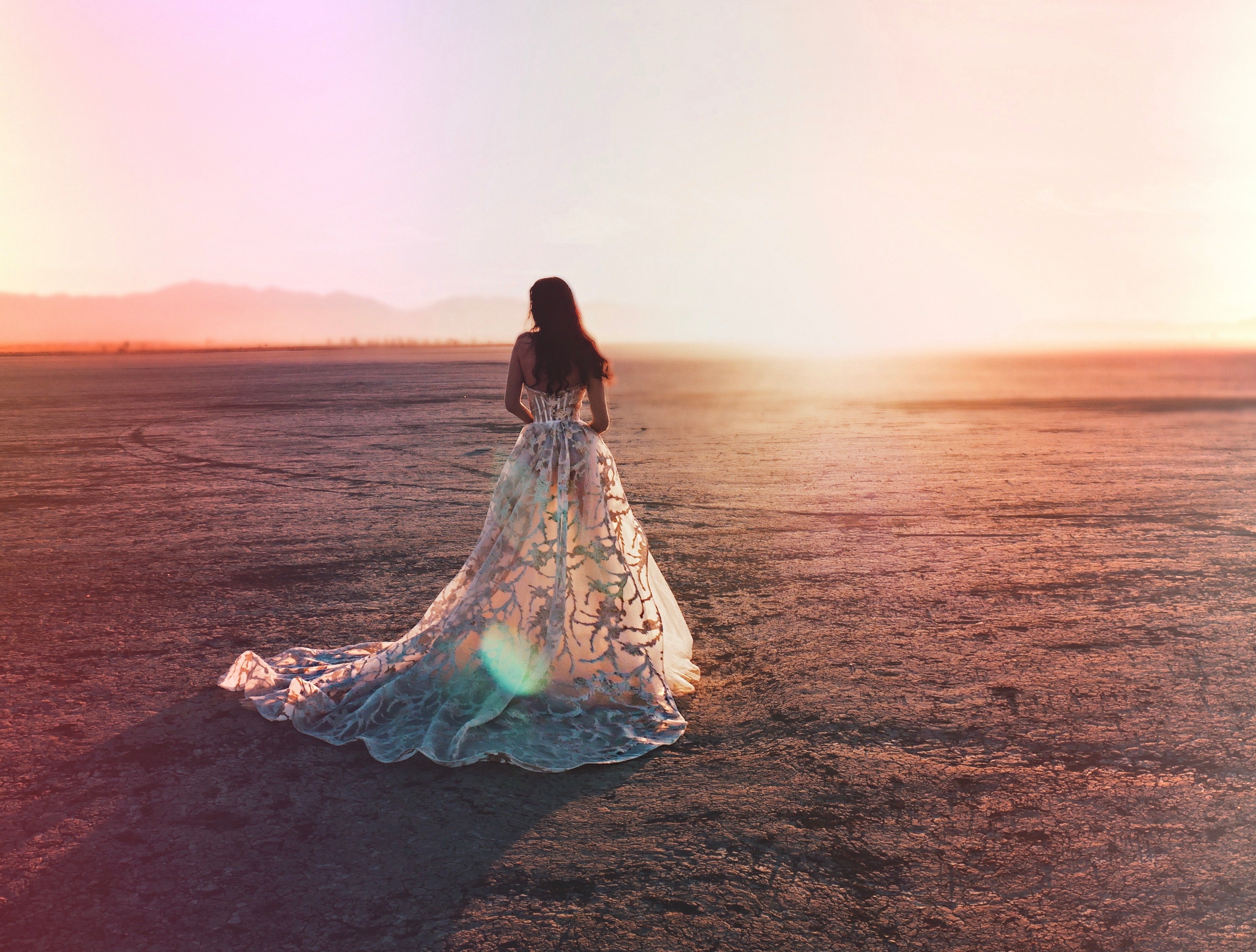 Wide shot of organza and tulle ball gown at sunset