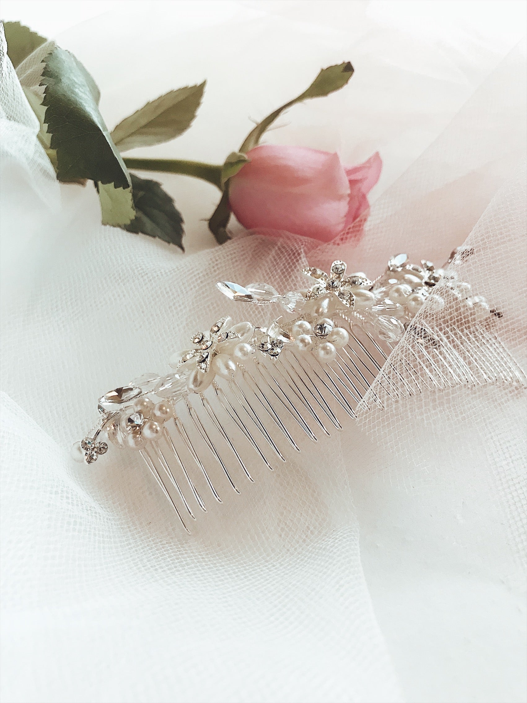 Closeup detailing of the Lauren Elaine Bridal "Honeysuckle" wedding hair comb with crystal and pearl detailing