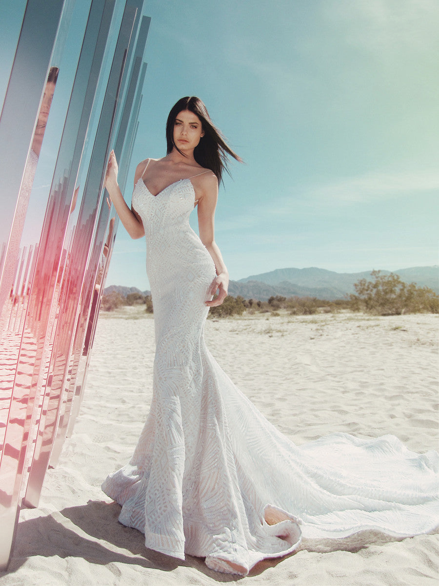 Prism sequin wedding dress with horsehair hemline and spaghetti straps by Lauren Elaine Bridal