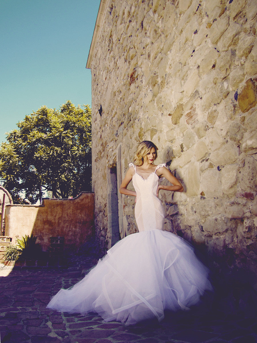 Lace sleeve mermaid wedding gown by Lauren Elaine Bridal.