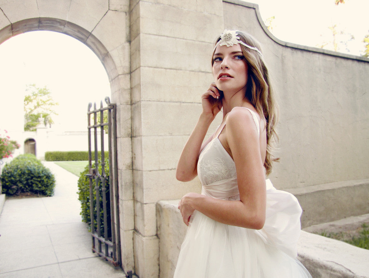 Effortlessly elegant bridal gown by Lauren Elaine Bridal. Made in the USA.