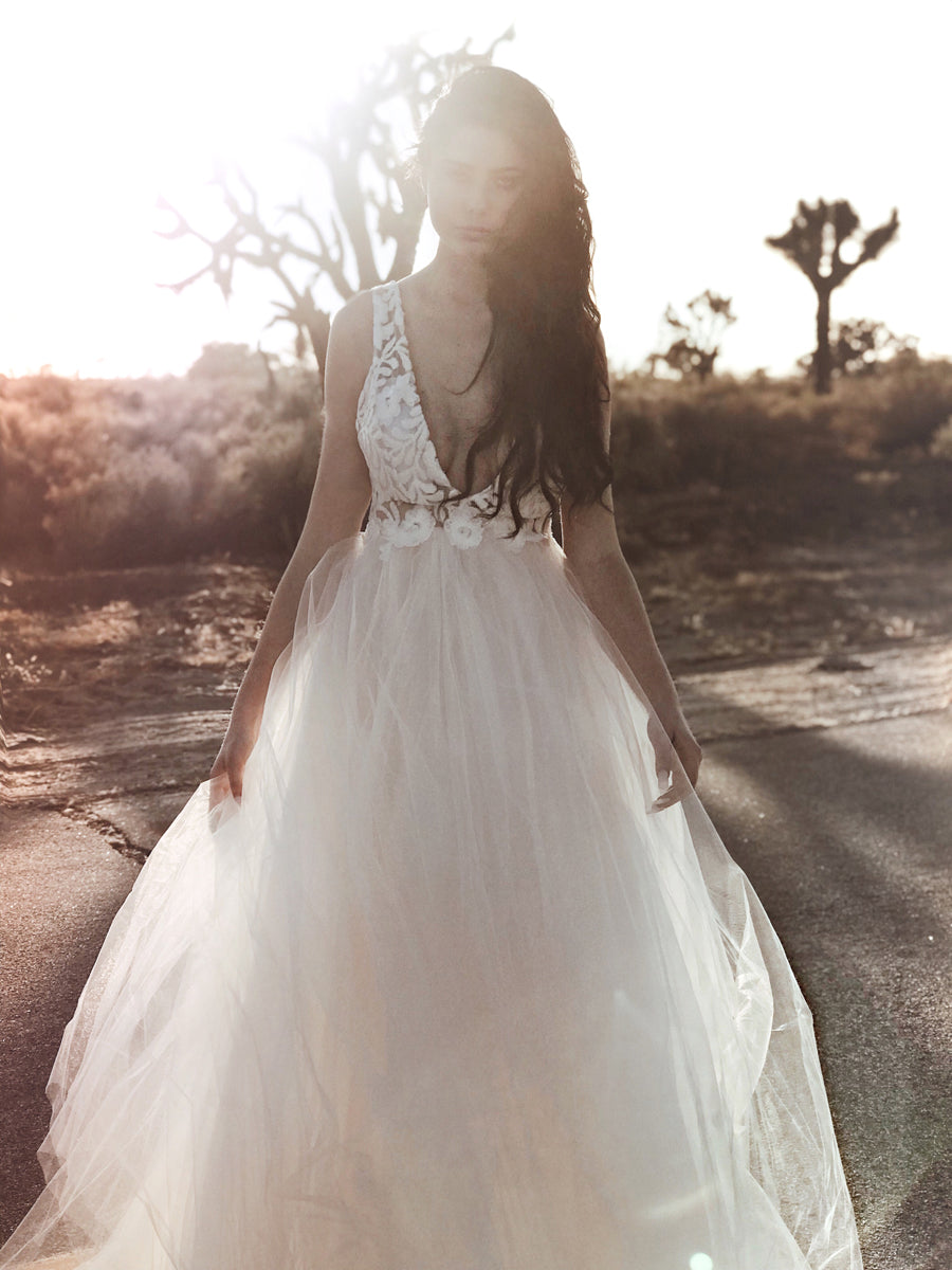 Lauren Elaine Isdora  Plunging V-neck Illusion Sequin Wedding Dress