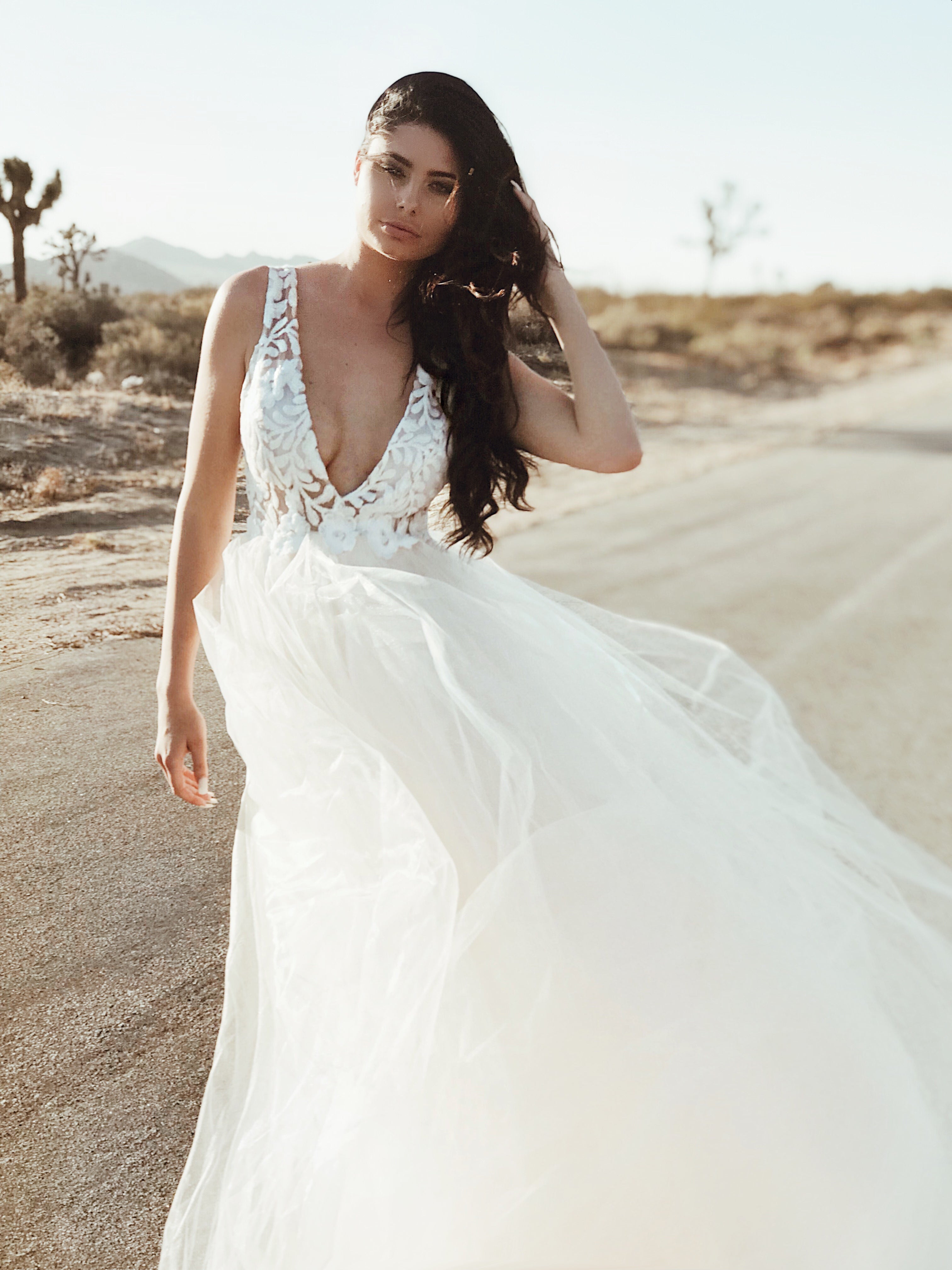 V-neck illusion sequin ball gown wedding dress by Lauren Elaine Los Angeles