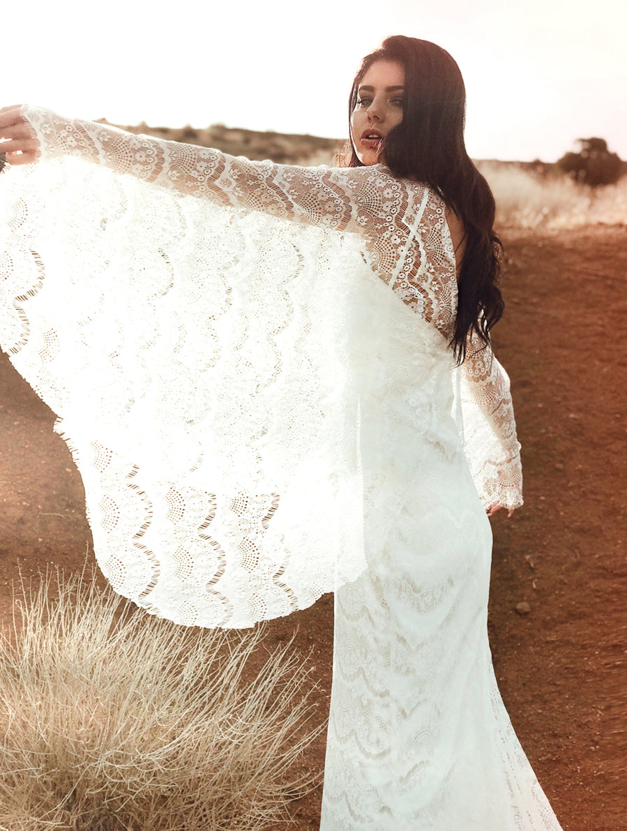 Lace angel wing cape sleeves on the Lauren Elaine "Larkin" wedding dress from the Pearl by Lauren Elaine Bridal collection