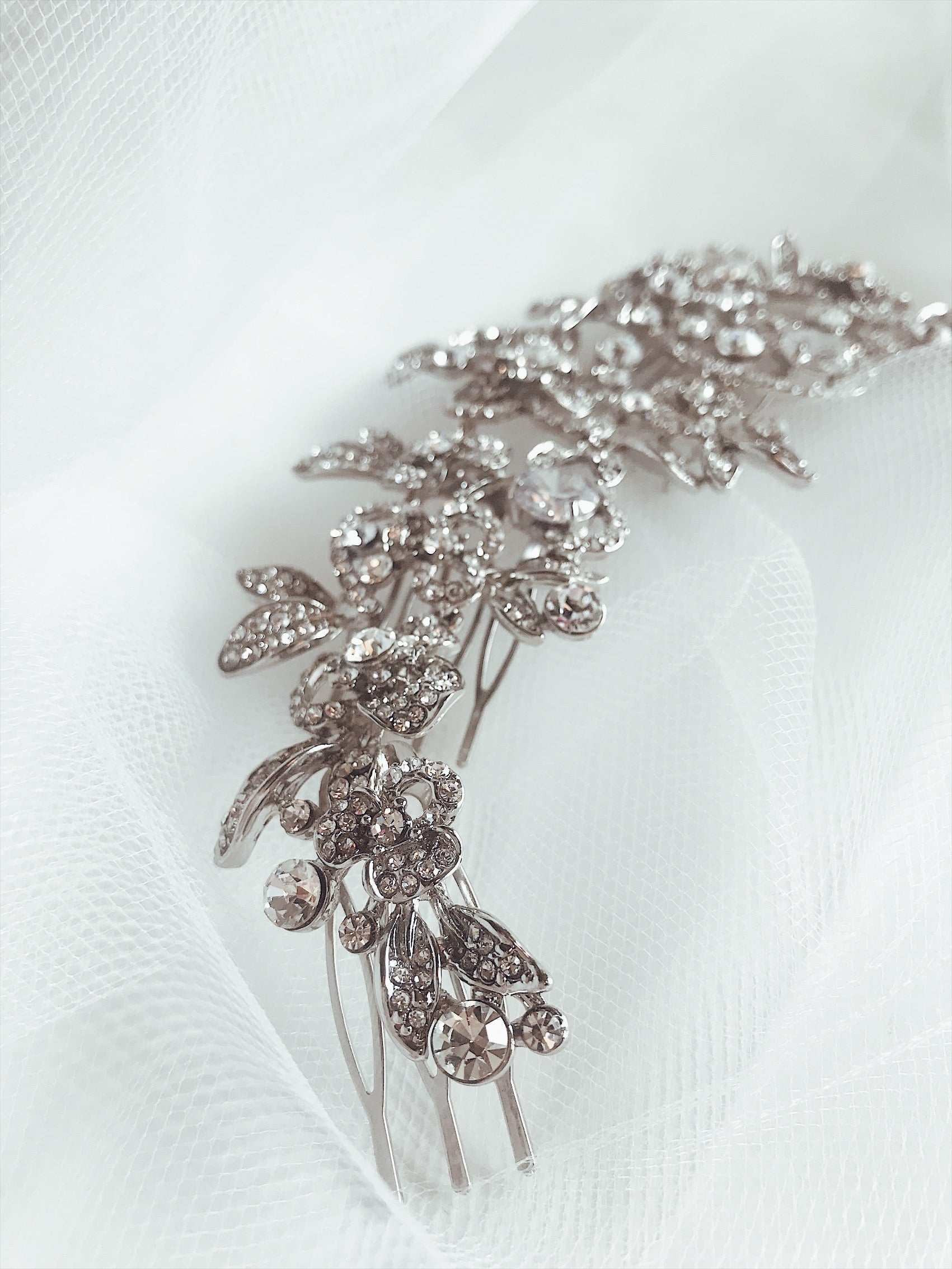 Pave crystal and crystal stone detailing on the "Zinnia" hair comb from Lauren Elaine Bridal Accessories