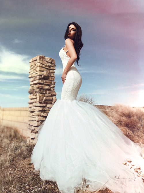 Backless sparkle lace mermaid wedding dress with 6ft cathedral train and satin spaghetti straps. Lola from the Pearl by Lauren Elaine Bridal Collection.